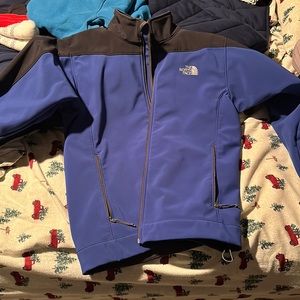 Used Large The North Face soft shell coat. Blue and black.